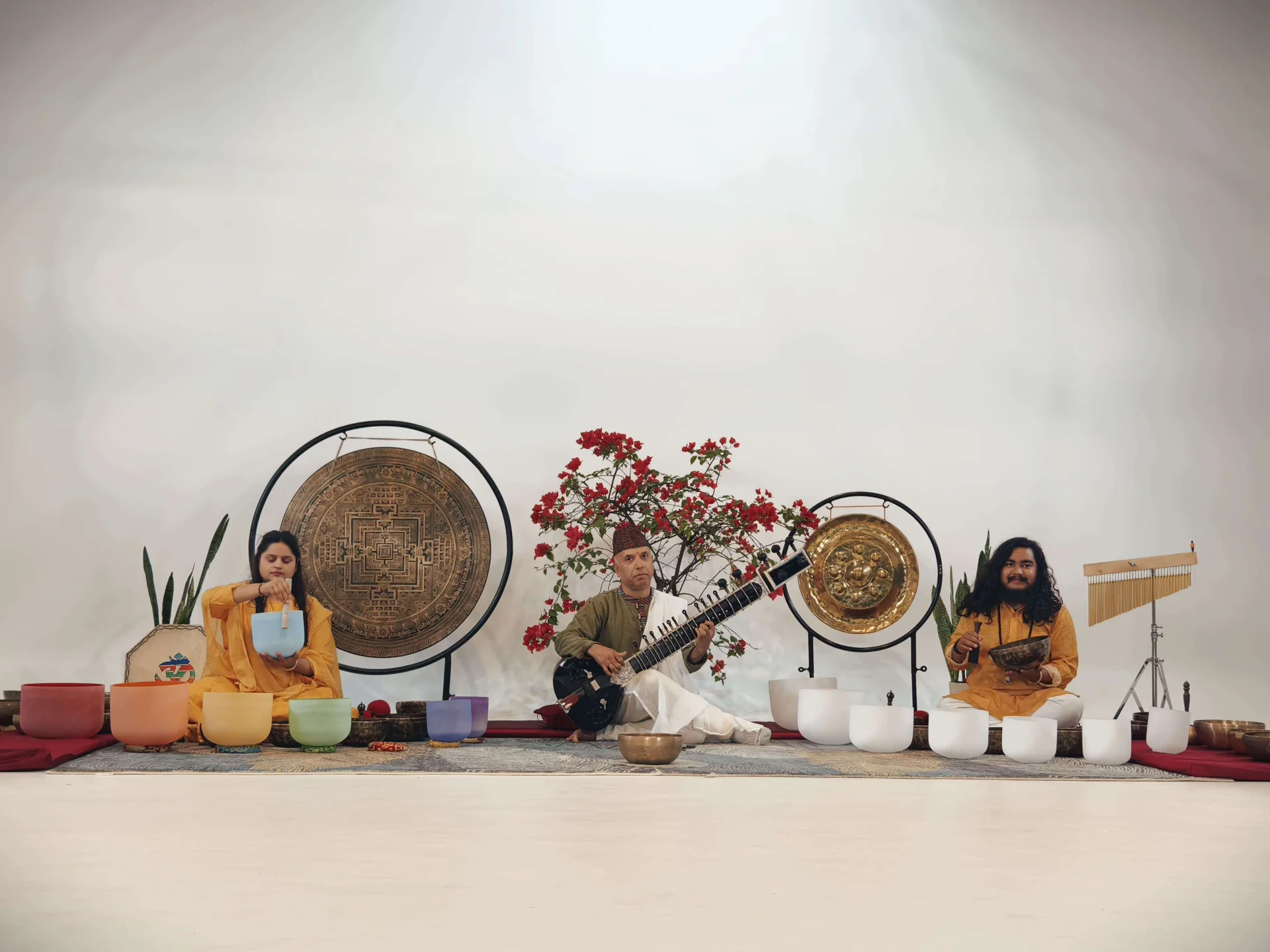 Sound healing ensemble with gongs, crystal singing bowls and sitar at Jivan Parivartan, Nepal